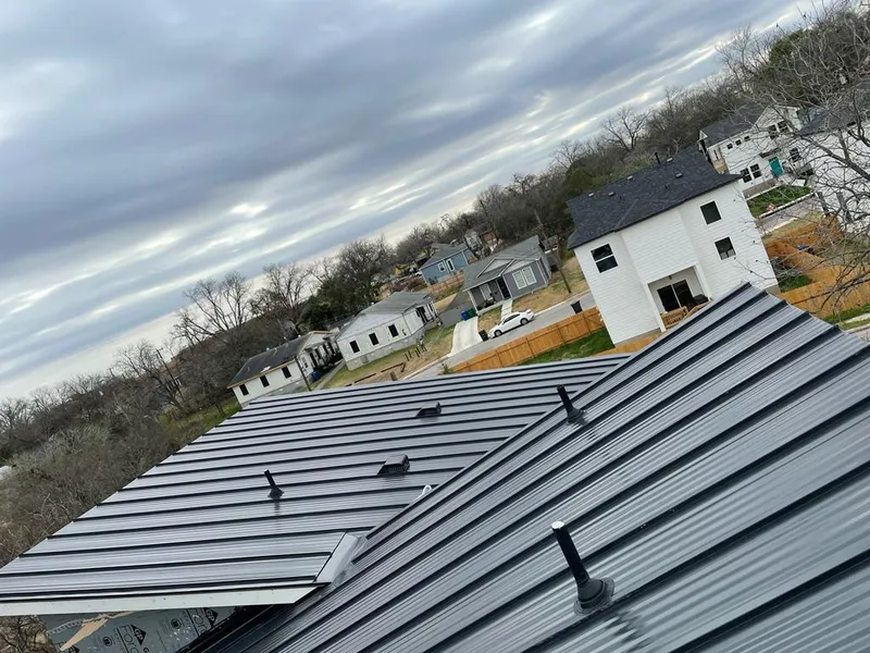 Standing seam metal roof panels with vents for Skylight Repair in Owosso